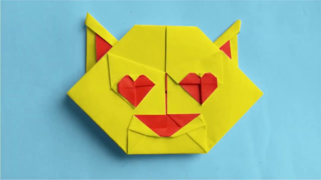 目がハートの猫 絵文字 (Smiling Cat with Heart-Eyes Emoji) 😻